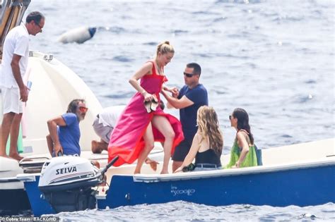 amber heard sexy|Amber Heard dons a tiny red bikini on a yacht in the Amalfi Coast